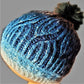 Brioche Knitted Hat. A beauty! Turquoise variations in color.