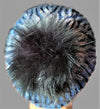 Brioche Knitted Hat with fluffy faurxfur pom pom on top.