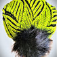 Trendy Hat. Neon and Black in color. Brioche style.